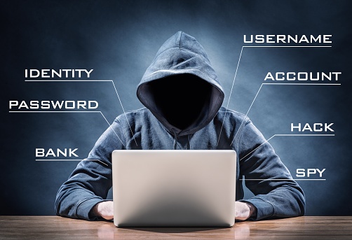 Thief hacking on computer